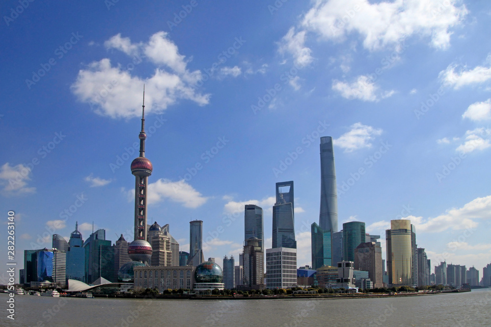 Fototapeta premium The famous skyline of Shanghai, China, on a sunny day