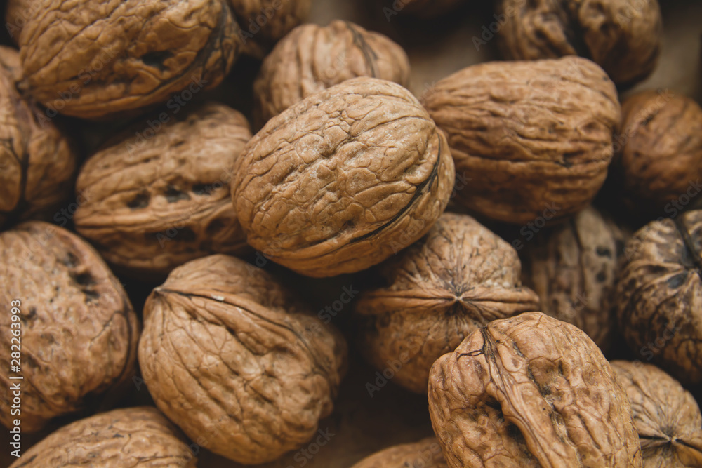Wallnuts in shell, natural healthy food Wallnuts in shell, natural healthy food