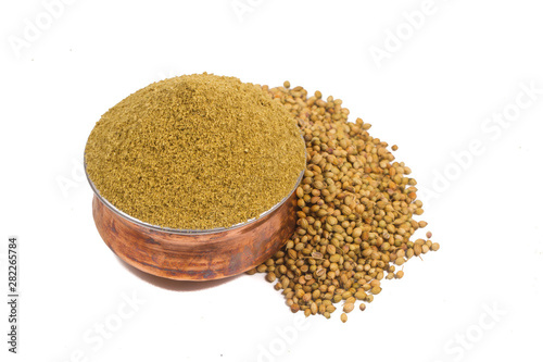 Coriander powder with coriander seeds.