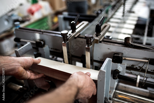 An old printing machine in printing factory