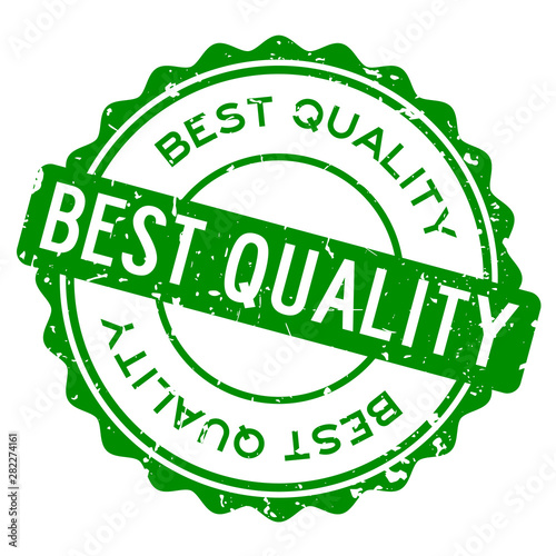Grunge green best quality word round rubber seal stamp on white background