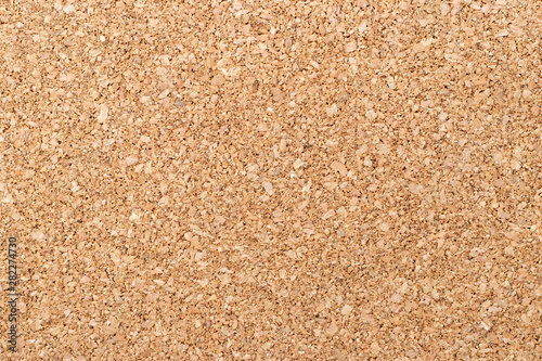 Brown yellow color of cork board textured background photo