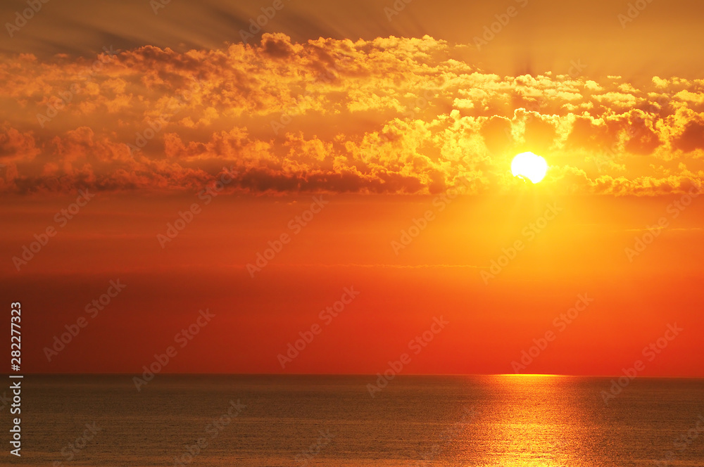 Beautiful sea and red sun rise.