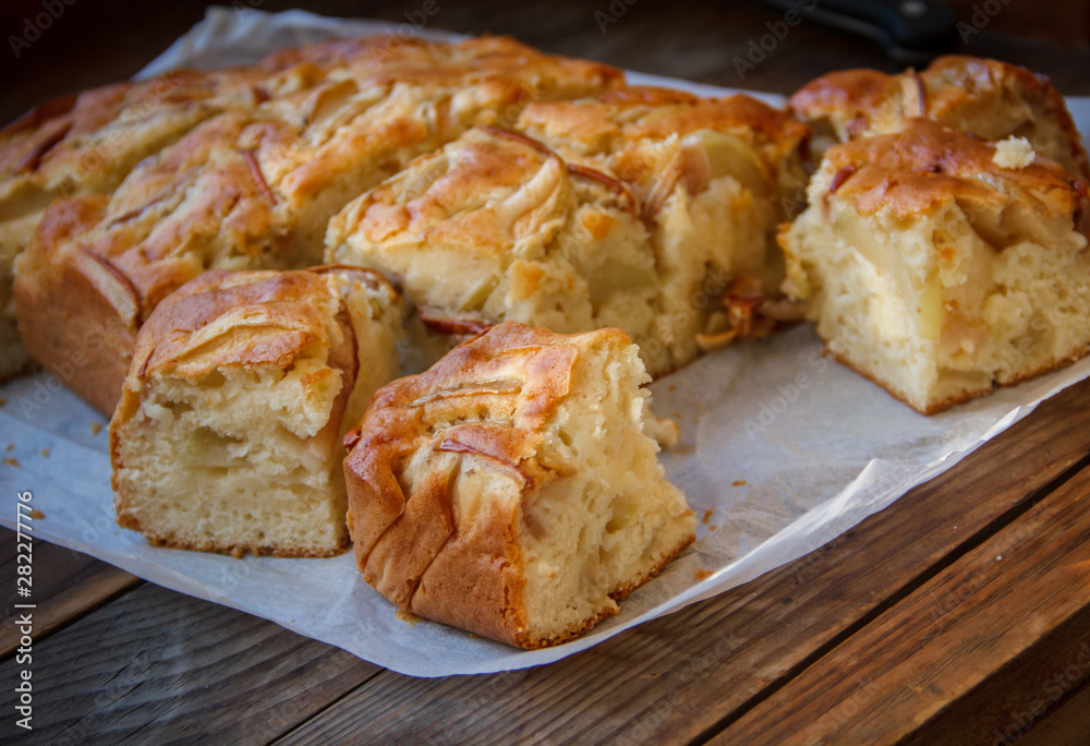 Fresh cakes. Apple pie on a wooden table. Country style.. Fresh cakes. Apple pie on a wooden table. Country style..