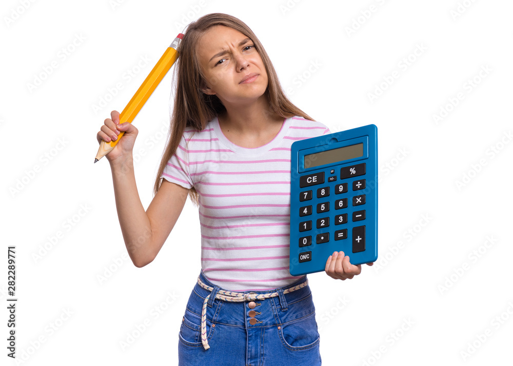 Thoughtful student holding big calculator and pencil. Portrait of funny cute teen girl, isolated on white background. Unhappy dreaming child Back to school. Thoughtful student holding big calculator and pencil. Portrait of funny cute teen girl, isolated on white background. Unhappy dreaming child Back to school.