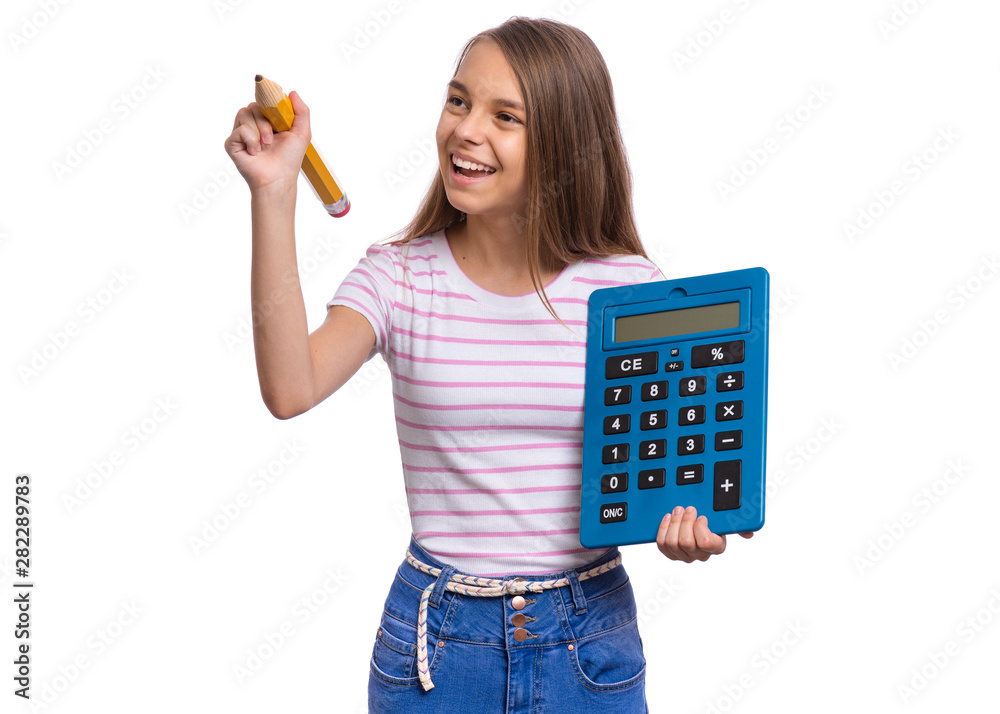 Smart student holding big calculator and pencil. Portrait of funny cute teen girl writing something, isolated on white background. Happy smiling child Back to school. Smart student holding big calculator and pencil. Portrait of funny cute teen girl writing something, isolated on white background. Happy smiling child Back to school.