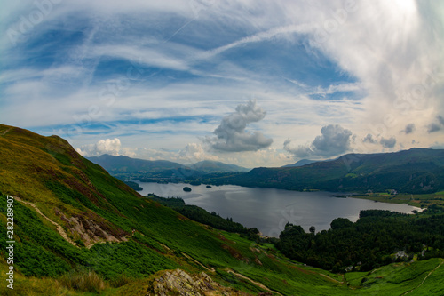 Derwentwater lake landscape with beautiful sky full of random shape clouds made from Cat Bells hill top, Lake District, Cumbria, England, United Kingdom © Piotr