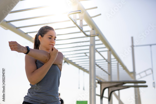 Beautiful woman stretching at outdoor training spot or street workout in Barcelona Free Download Beautiful woman stretching at outdoor training spot or street workout in Barcelona - GFXLoad