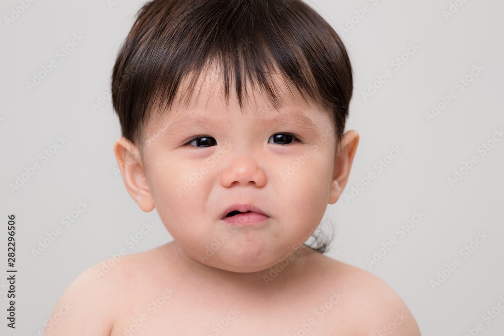 Asian little boy with bad temper