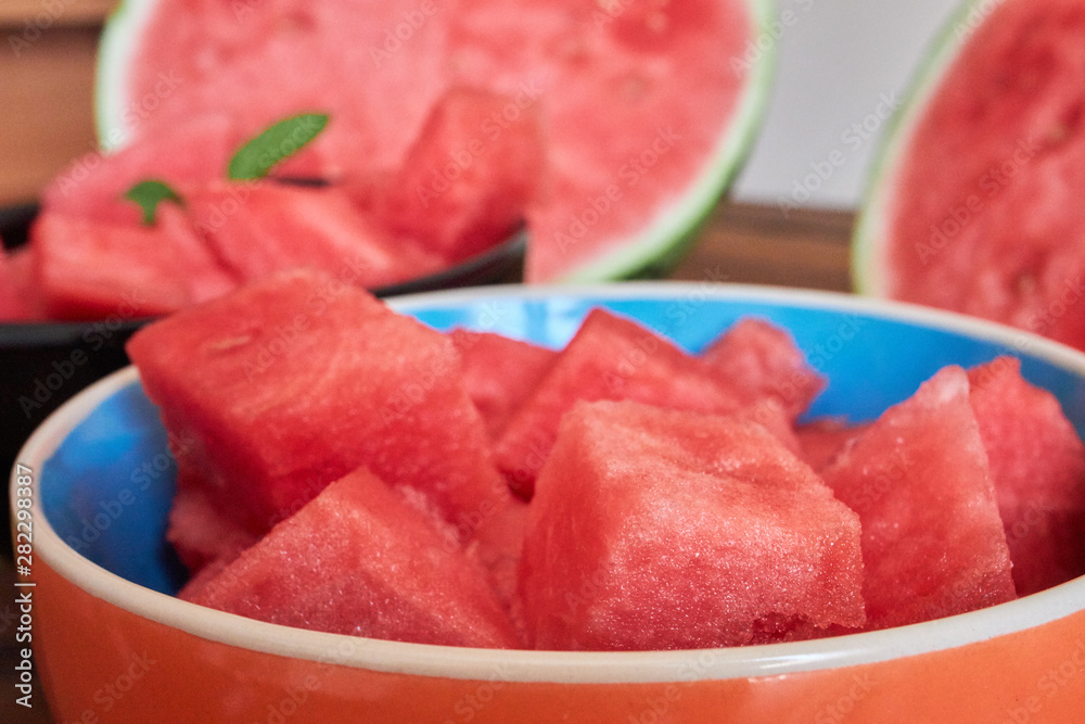 Two bowl with fresh watermelon on dark table Two bowl with fresh watermelon on dark table