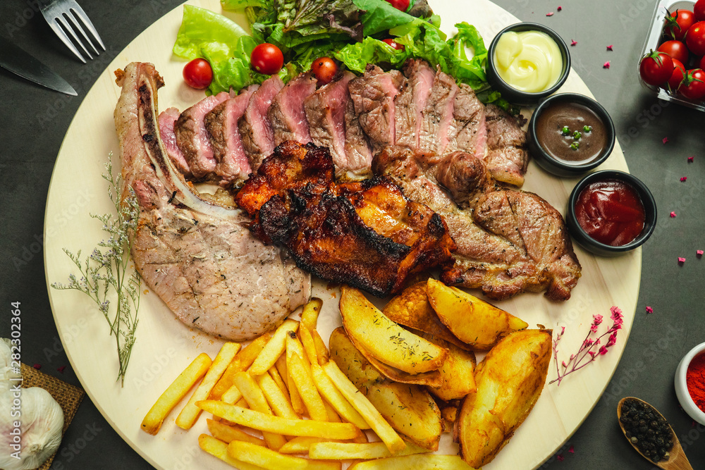 Food shot mix grilled steak with fried and salad Food shot mix grilled steak with fried and salad