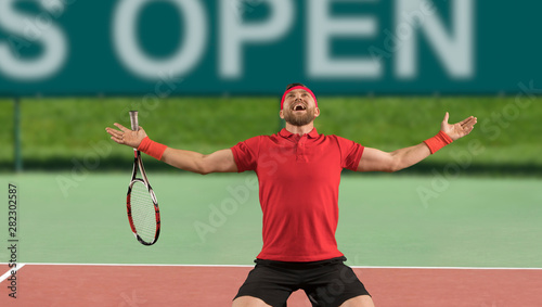 Man tennis player celebrating winner