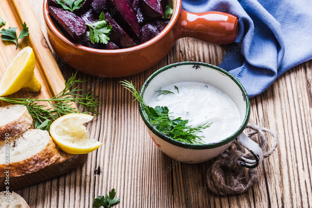 Yogurt dip with parsley, roasted beets, vegan plant based meal Yogurt dip with parsley, roasted beets, vegan plant based meal