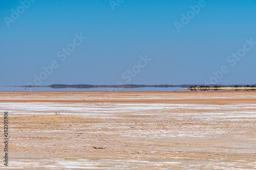 Lake Maclead dry lake in Western Australia mirage at horizon photo
