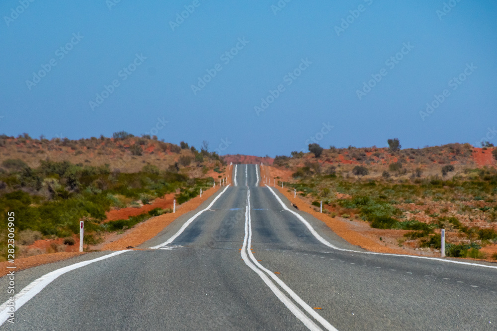 Road straightening up on the way to Coral Bay Western Australia