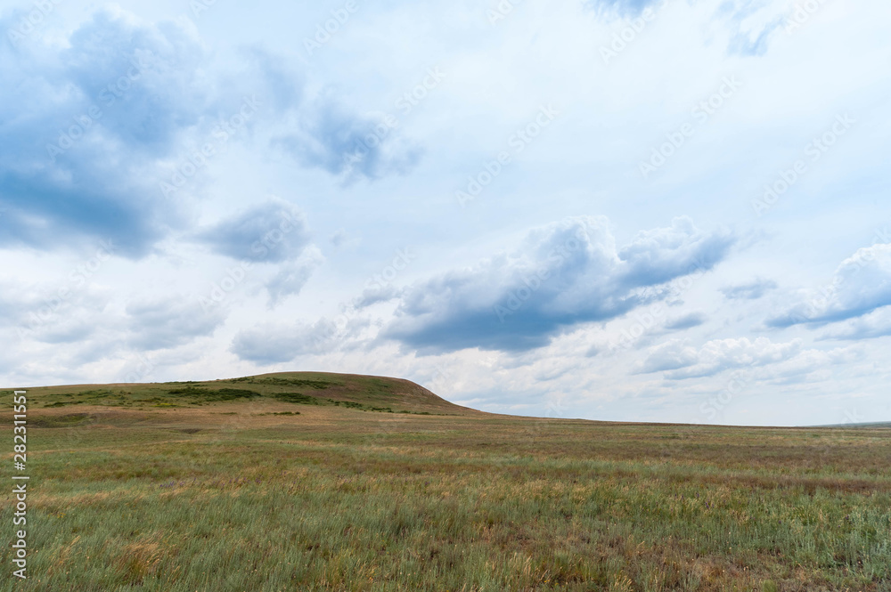 Tourist places of Russia. Beautiful landscapes of the world. Limestone pits against the bright sky and clouds