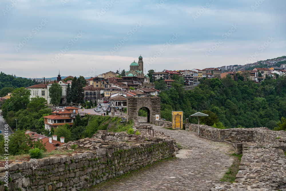 Entrance gate of Tsarevets Fortress and Veliko Tarnovo old town at background, Bulgaria