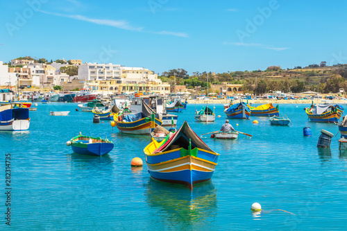 The traditional eyed boats in the harbor of fishing village Marsaxlokk in Malta © kerenby
