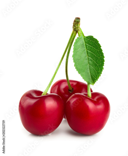 Sweet red cherries with leaves isolated on white background macro