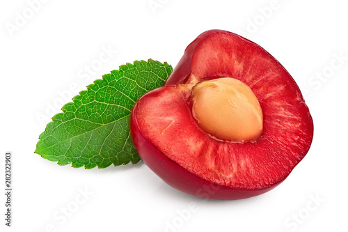 half cherry with leaf closeup isolated on white background,