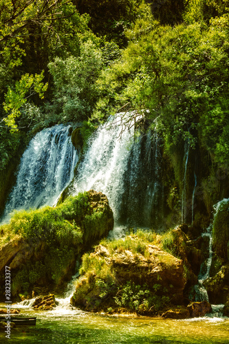 Kravice waterfall on the Trebizat River in Bosnia and Herzegovina in autumn.  Miracle of Nature in Bosnia and Herzegovina. The Kravice waterfalls, originally known as the Kravica waterfalls