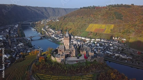 Flight around autumn Cochem castle vineyards, Mosel valley, Germany