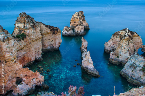 Fantastic rock formations set in a turquoise water at Ponta da Piedade, Lagos, Western Algarve coast, Portugal. 
