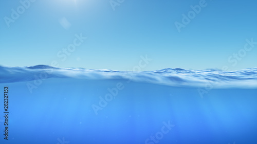 Ocean or sea in half water half sky. Rays of sunlight shining from above penetrate deep clear blue water. Realistic dark blue ocean surface. View - half of the sky  half water. 3D rendering