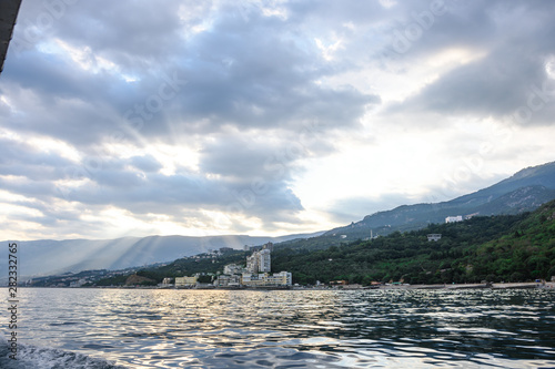 Wallpaper Mural View of the black sea coast in the sunset from the sea. view from ship to shore Torontodigital.ca