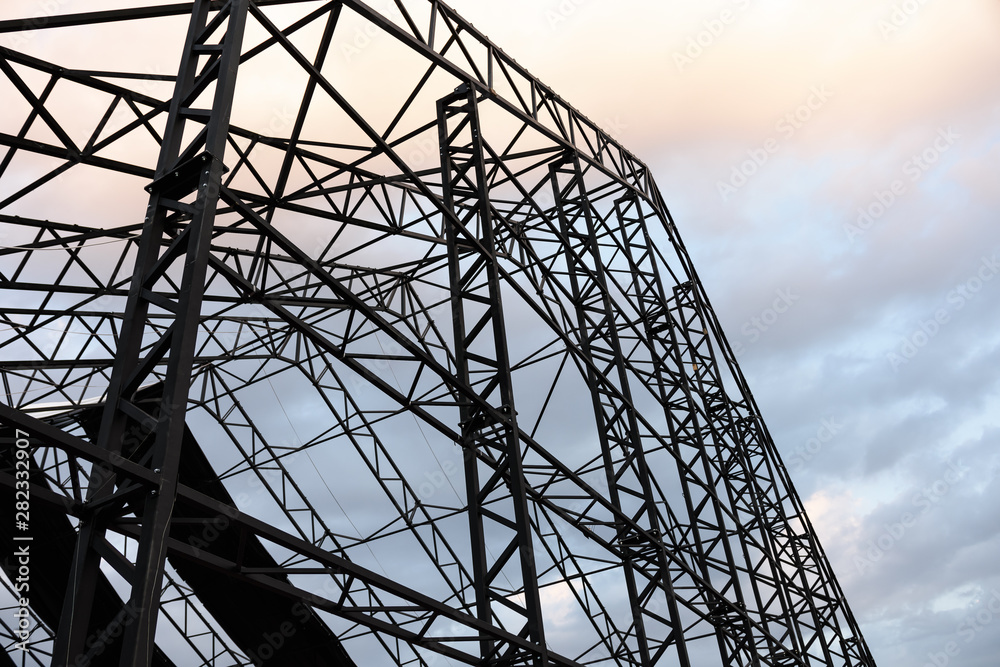metal structures on the background of beautiful clouds metal structures on the background of beautiful clouds