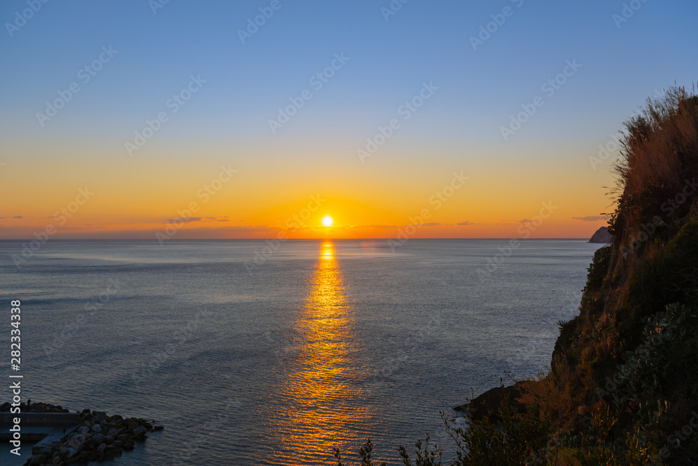 Sunset over  the sea in Cinque Terre national park, Italy