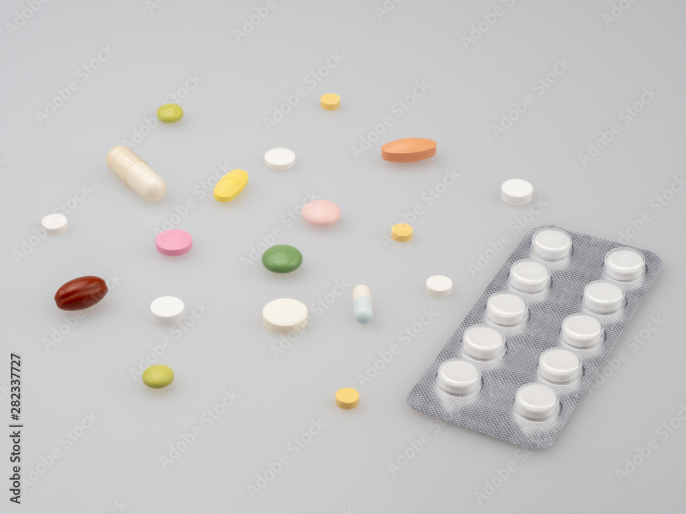 Pills. The medicine. Ambulance. Health. On a neutral background. Still life. Pills. The medicine. Ambulance. Health. On a neutral background. Still life.