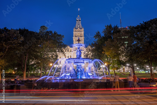 The Tourny fountain (fontaine de Tourny) in Old Quebec city, Canada. The National Assembly of Quebec is in background