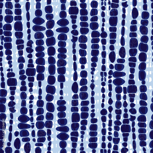 Vector blue shibori vertical blob lines seamless pattern. Suitable for textile, gift wrap and wallpaper.