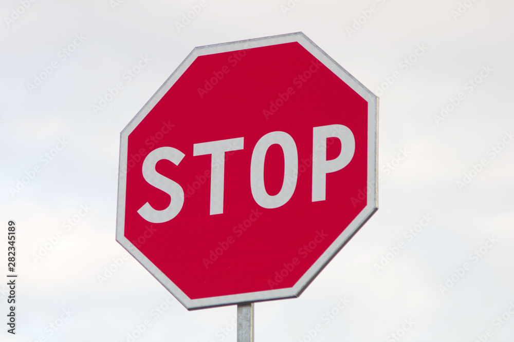 Stop sign on sky background