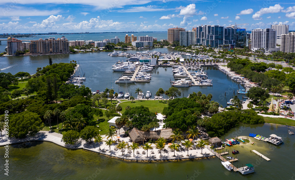 Drone view of Marina Jack , including Bayfront park and Oleary's Tiki Bar & Grill, looking North towards Sarasota bay and the high rise landscape