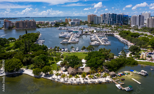 Drone view of Marina Jack , including Bayfront park and Oleary's Tiki Bar & Grill, looking North towards Sarasota bay and the high rise landscape