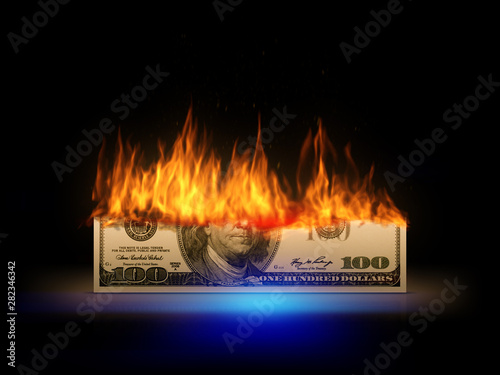 Photos a burning 100 dollar bill