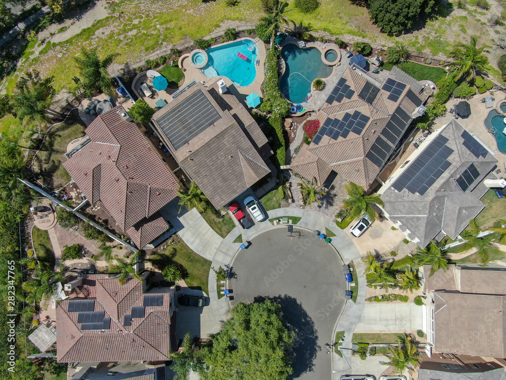 Aerial view suburban neighborhood with  big villas next to each other in Black Mountain, San Diego, California, USA. Aerial view of residential modern subdivision luxury house.
