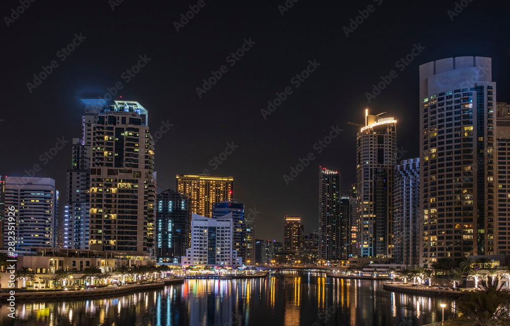 View of Dubai Marina by night in long exposure, UAE. May 2019