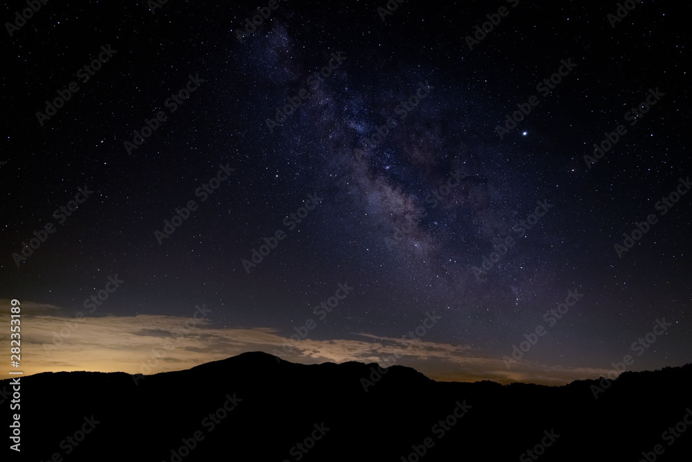 Milky Way Galaxy arm seen over Grandfather Mountain in North Carolina at night Milky Way Galaxy arm seen over Grandfather Mountain in North Carolina at night