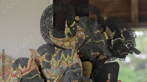 Faces of wayang puppet characters, closeup photo