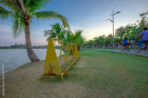 The background of the bicycle parking area in the park, allowing people to exercise in the evening