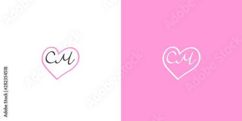 Wedding hand-drawn C M monogram in a  pink heart