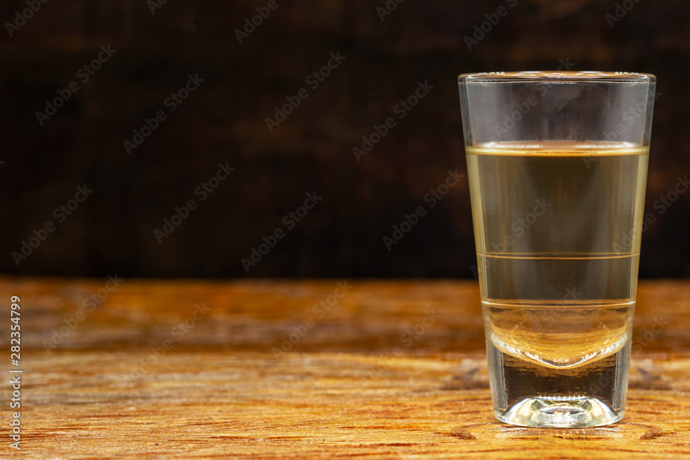 Cachaça, drips, cane or sugarcane is the name given to sugarcane brandy produced in Brazil. It is used in the preparation of the worldwide known cocktail caipirinha. traditional drink from brazil Cachaça, drips, cane or sugarcane is the name given to sugarcane brandy produced in Brazil. It is used in the preparation of the worldwide known cocktail caipirinha. traditional drink from brazil