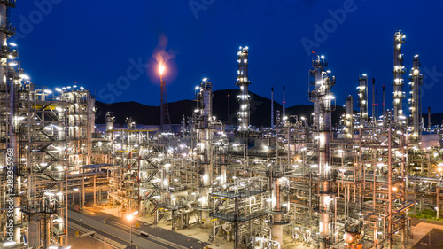 Aerial view petrochemical plant and oil refinery plant background at night   Petrochemical oil refinery factory plant at night.