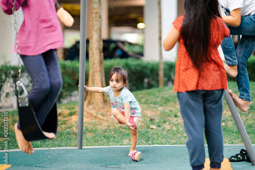 Asian kids at the playground. Play, enjoy, happy and excitement concept.