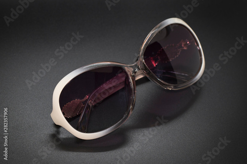 Image of modern fashionable sunglasses isolated on black background, Glasses.