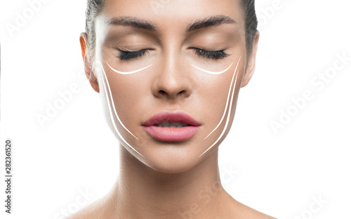 Face lift treatment anti aging skincare woman concept. woman face with lifting lines on white background. photo