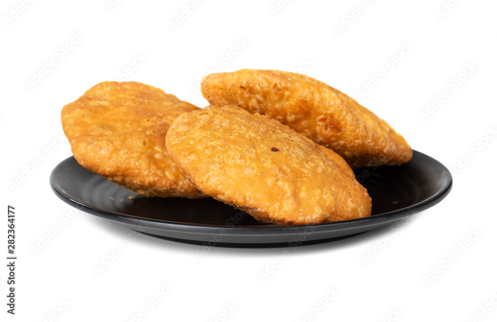 Indian Popular Spicy Snack Kachori Also Know as Kachodi, Katchuri And Fried Dumpling on White Background Indian Popular Spicy Snack Kachori Also Know as Kachodi, Katchuri And Fried Dumpling on White Background